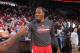 PORTLAND, OR - NOVEMBER 5: Dwight Howard #12 of the Houston Rockets smiles and looks on against the Portland Trail Blazers on November 5, 2013 at the Moda Center Arena in Portland, Oregon. NOTE TO USER: User expressly acknowledges and agrees that, by downloading and or using this photograph, user is consenting to the terms and conditions of the Getty Images License Agreement. Mandatory Copyright Notice: Copyright 2013 NBAE (Photo by Sam Forencich/NBAE via Getty Images)
