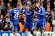 LONDON, ENGLAND - NOVEMBER 06: Samuel Eto'o #29 of Chelsea celebrates with teammates after scoring the opening goal during the UEFA Champions League Group E match between Chelsea and FC Schalke 04 at Stamford Bridge on November 6, 2013 in London, England. (Photo by Jamie McDonald/Getty Images)