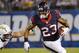SAN DIEGO, CA - SEPTEMBER 9: Arian Foster #23 of the Houston Texans runs against the tackle Bront Bird #97 of San Diego Chargers during the Texan's 31-28 win over the Chargers on September 9, 2013 at Qualcomm Stadium in San Diego, California. (Photo by Donald Miralle/Getty Images)