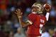 TALLAHASSEE, FL - NOVEMBER 02: Jameis Winston #5 of the Florida State Seminoles warms up during a game against the Miami Hurricanes at Doak Campbell Stadium on November 2, 2013 in Tallahassee, Florida. (Photo by Mike Ehrmann/Getty Images)