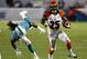 Oct 31, 2013; Miami Gardens, FL, USA; Cincinnati Bengals running back Gio Bernard (25) runs the ball past Miami Dolphins middle linebacker Dannell Ellerbe (59) in the second half at Sun Life Stadium. Miami won 22-20. Mandatory Credit: Robert Mayer-USA TODAY Sports