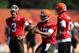 Jul 25, 2013; Berea, OH, USA; Cleveland Browns quarterback Jason Campbell (17) takes a snap between quarterback Brandon Weeden (3) and quarterback Brian Hoyer (6) during training camp at the Cleveland Browns Training Facility. Mandatory Credit: Ron Schwane-USA TODAY Sports