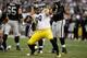 OAKLAND, CA - OCTOBER 27: Brett Keisel #99 of the Pittsburgh Steelers reacts after making a tackle against the Oakland Raiders at O.co Coliseum on October 27, 2013 in Oakland, California. (Photo by Ezra Shaw/Getty Images)