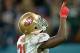 Oct 27, 2013; London, United Kingdom; San Francisco 49ers running back Frank Gore (21) points skyward in celebration after a touchdown in the NFL International Series game against the Jacksonville Jaguars at Wembley Stadium. The 49ers defeated the Jaguars 42-10. Mandatory Credit: Kirby Lee-USA TODAY Sports