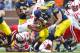 November 19, 2011; Ann Arbor, MI, USA; Michigan Wolverines running back Fitzgerald Toussaint (28) runs the ball as Nebraska Cornhuskers cornerback Andrew Green (11) tries to tackle him in the fourth quarter at Michigan Stadium. Michigan won 45-17. Mandatory Credit: Rick Osentoski-USA TODAY Sports