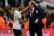 LONDON, ENGLAND - OCTOBER 15: England manager Roy Hodgson shakes hands with Andros Townsend of England as they qualify for the World Cup in Brazil after the FIFA 2014 World Cup Qualifying Group H match between England and Poland at Wembley Stadium on October 15, 2013 in London, England. (Photo by Mike Hewitt/Getty Images)