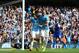 MANCHESTER, ENGLAND - OCTOBER 05: Sergio Aguero of Manchester City celebrates with teammate Alvaro Negredo (R) after scoring his team's third goal from the penalty spot during the Barclays Premier League match between Manchester City and Everton at Etihad Stadium on October 5, 2013 in Manchester, England. (Photo by Michael Steele/Getty Images)