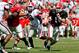 April 14, 2011; Athens, GA, USA; Georgia Bulldogs quarterback Hutson Mason (14) scrambles in the first half of the Georgia spring game at Sanford Stadium. Mandatory Credit: Daniel Shirey-USA TODAY Sports