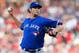 BOSTON, MA - JUNE 28: Josh Johnson #55 of the Toronto Blue Jays throws against the Boston Red Sox in the 1st inning at Fenway Park on June 28, 2013 in Boston, Massachusetts. (Photo by Jim Rogash/Getty Images)