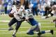 DETROIT, MI - SEPTEMBER 29: Jay Cutler #6 of the Chicago Bears tries to escape the fourth quarter tackle of Willie Young #79 of the Detroit Lions at Ford Field on September 29, 2013 in Detroit, Michigan. Detroit won the game 40-32. (Photo by Gregory Shamus/Getty Images)
