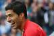 NEWCASTLE UPON TYNE, ENGLAND - OCTOBER 19: Luis Suarez of Liverpool smiles during the Barclays Premier League match between Newcastle United and Liverpool at St James' Park on October 19, 2013 in Newcastle upon Tyne, England. (Photo by Julian Finney/Getty Images)