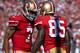 SAN FRANCISCO, CA - OCTOBER 13: Vernon Davis #85 and Colin Kaepernick #7 of the San Francisco 49ers celebrates after Davis scored a touchdown on a sixty one yard pass play during the second quarter against the Arizona Cardinals at Candlestick Park on October 13, 2013 in San Francisco, California. (Photo by Thearon W. Henderson/Getty Images)