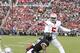Nov 2, 2013; West Lafayette, IN, USA; Ohio State Buckeyes quarterback Braxton Miller (5) throws a pass for a touchdown against the Purdue Boilermakers at Ross Ade Stadium. Ohio State defeats Purdue 56-0. Mandatory Credit: Brian Spurlock-USA TODAY Sports