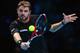 LONDON, ENGLAND - NOVEMBER 08: Stanislas Wawrinka of Switzerland hits a backhand in his men's singles match against David Ferrer of Spain during day five of the Barclays ATP World Tour Finals at O2 Arena on November 8, 2013 in London, England. (Photo by Julian Finney/Getty Images)