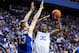 LEXINGTON, KY - NOVEMBER 08: Julius Randle #30 of the Kentucky Wildcats shoots the ball while defended by D.J. Cunningham #33 of the UNC Asheville Bulldogs during the game at Rupp Arena on November 8, 2013 in Lexington, Kentucky. (Photo by Andy Lyons/Getty Images)