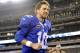 Eli Manning is a happy fella when he is able to lead a balanced offense.