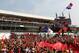 Fans flood the track for the podium celebration at the 2013 Italian Grand Prix.