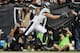 OAKLAND, CA - NOVEMBER 03: Wide receiver Riley Cooper #14 of the Philadelphia Eagles pulls in a touchdown catch against the Oakland Raiders in the second quarter on November 3, 2013 at O.co Coliseum in Oakland, California. (Photo by Brian Bahr/Getty Images)