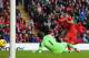 LIVERPOOL, ENGLAND - NOVEMBER 09: Luis Suarez of Liverpool scores the third goal during the Barclays Premier League match between Liverpool and Fulham at Anfield on November 9, 2013 in Liverpool, England. (Photo by Alex Livesey/Getty Images)