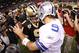NEW ORLEANS - DECEMBER 19: (L-R) Quarterback Drew Brees #9 of the New Orleans Saints congratulates quarterback Tony Romo #9 of the Dallas Cowboys following their 24-17 loss to the Cowboys at Louisiana Superdome on December 19, 2009 in New Orleans, Louisiana. (Photo by Chris Graythen/Getty Images)