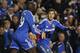 LONDON, ENGLAND - NOVEMBER 09: Eden Hazard of Chelsea celebrates with team mate Demba Ba after scoring the equaliser during the Barclays Premier League match between Chelsea and West Bromwich Albion at Stamford Bridge on November 09, 2013 in London, England. (Photo by Charlie Crowhurst/Getty Images)