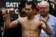 HOUSTON, TX - DECEMBER 14: Nonito Donaire of the Philippines poses on stage at his official weigh-in at PlazAmericas Mall a day prior to his fight with Jorge Arce of Mexico on December 14, 2012 in Houston, Texas. (Photo by Scott Halleran/Getty Images)