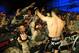 Nov 6, 2013; Fort Campbell, KY, USA; Tim Kennedy (red gloves) celebrates his win against Rafael Natal (blue gloves) in the middleweight bout during UFC Fight for the Troops at Fort Campbell. Mandatory Credit: Joshua Lindsey-USA TODAY Sports