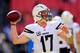 LANDOVER, MD - NOVEMBER 03: Quarterback Philip Rivers #17 of the San Diego Chargers throws a pass while warming up before the start of the Chargers game against the Washington Redskins at FedExField on November 3, 2013 in Landover, Maryland. (Photo by Rob Carr/Getty Images)