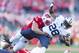Nov 9, 2013; Madison, WI, USA; Wisconsin Badgers linebacker Chris Borland (44) tackles Brigham Young Cougars running back Adam Hine (28) during the first quarter at Camp Randall Stadium. Mandatory Credit: Jeff Hanisch-USA TODAY Sports