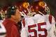 SOUTH BEND, IN - OCTOBER 19: Interim head coach Ed Orgeron of the University of Southern California Trojans gives encouragement to Lamar Dawson #55 against the Notre Dame Fighting Irish at Notre Dame Stadium on October 19, 2013 in South Bend, Indiana. Notre Dame defeated USC 14-10. (Photo by Jonathan Daniel/Getty Images)