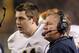 Nov 9, 2013; Pittsburgh, PA, USA; Notre Dame Fighting Irish quarterback Tommy Rees (left) and Irish head coach Brian Kelly (right) wait for a replay result against the Pittsburgh Panthers during the second quarter at Heinz Field. Mandatory Credit: Charles LeClaire-USA TODAY Sports