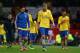 MANCHESTER, ENGLAND - NOVEMBER 10: Nicklas Bendtner of Arsenal walks off with his team-mates at the end of the Barclays Premier League match between Manchester United and Arsenal at Old Trafford on November 10, 2013 in Manchester, England. (Photo by Alex Livesey/Getty Images)