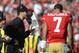 November 10, 2013; San Francisco, CA, USA; San Francisco 49ers head coach Jim Harbaugh (left) talks to quarterback Colin Kaepernick (7) against the Carolina Panthers during the first quarter at Candlestick Park. Mandatory Credit: Kyle Terada-USA TODAY Sports