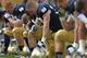 SOUTH BEND, IN - OCTOBER 20: Players for the Notre Dame Fighting Irish pray in the end zone before a game against the BYU Cougars at Notre Dame Stadium on October 20, 2012 in South Bend, Indiana. Notre Dame defeated BYU 17-14. (Photo by Jonathan Daniel/Getty Images)