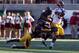 Nov 9, 2013; Berkeley, CA, USA; USC Trojans running back Javorius Allen (37) escapes the California Golden Bears defenders to run for a touchdown during the third quarter at Memorial Stadium. The USC Trojans defeated the California Golden Bears 62-28. Mandatory Credit: Kelley L Cox-USA TODAY Sports