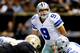 NEW ORLEANS, LA - NOVEMBER 10: Quarterback Tony Romo #9 of the Dallas Cowboys calls a play against the New Orleans Saints during a game at the Mercedes-Benz Superdome on November 10, 2013 in New Orleans, Louisiana. (Photo by Ronald Martinez/Getty Images)