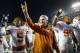 FORT WORTH, TX - OCTOBER 26: Head coach Mack Brown of the Texas Longhorns celebrates with Desmond Jackson #99 of the Texas Longhorns and Josh Turner #5 of the Texas Longhorns after the Longhorns beat the TCU Horned Frogs 30-7 at Amon G. Carter Stadium on October 26, 2013 in Fort Worth, Texas. (Photo by Tom Pennington/Getty Images)
