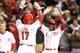 CINCINNATI, OH - APRIL 03: Brandon Phillips #4 of the Cincinnati Reds celebrates with Shin-Soo Choo #17 after Choo scored the winning run in the 9th inning against the Los Angeles Angels of Anaheim at Great American Ball Park on April 3, 2013 in Cincinnati, Ohio. The Reds won 5-4. (Photo by Andy Lyons/Getty Images)