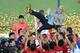 GUANGZHOU, CHINA - NOVEMBER 09: Marcello Lippi, head coach of Guangzhou Evergrande, is thrown in the air by his players as they celebrate after the AFC Champions League Final 2nd leg match between Guangzhou Evergrande and FC Seoul at Guangzhou Tianhe Sport Center Stadium on November 9, 2013 in Guangzhou, China. (Photo by Thananuwat Srirasant/Getty Images)
