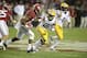Alabama's Jarrick Williams runs for a first down on a fake punt against LSU.