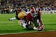 TUSCALOOSA, AL - NOVEMBER 09: Jalston Fowler #45 of the Alabama Crimson Tide scores a touchdown against Craig Loston #6 of the LSU Tigers in the fourth quarter of the game at Bryant-Denny Stadium on November 9, 2013 in Tuscaloosa, Alabama. (Photo by Kevin C. Cox/Getty Images)