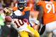 Oct 27, 2013; Denver, CO, USA; Washington Redskins quarterback Robert Griffin III (10) throws the ball away as he's hit by Denver Broncos linebacker Von Miller (58) during the second half at Sports Authority Field at Mile High. The Broncos won 45-21. Mandatory Credit: Chris Humphreys-USA TODAY Sports