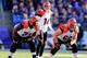 BALTIMORE, MD - NOVEMBER 10: Offensive linemen Andre Smith #71 and Kevin Zeitler #68 line up as quarterback Andy Dalton #14 of the Cincinnati Bengals signals against the Baltimore Ravens at M&T Bank Stadium on November 10, 2013 in Baltimore, Maryland. (Photo by Rob Carr/Getty Images)