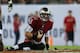 TAMPA, FL - NOVEMBER 11: Mike Glennon #8 of the Tampa Bay Buccaneers reacts after being sacked in the first half against the Miami Dolphins at Raymond James Stadium on November 11, 2013 in Tampa, Florida. (Photo by Mike Ehrmann/Getty Images)
