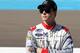 AVONDALE, AZ - NOVEMBER 09: Trevor Bayne, driver of the #6 WFG Ford, stands on the grid during qualifying for the NASCAR Nationwide Series ServiceMaster 200 at Phoenix International Raceway on November 9, 2013 in Avondale, Arizona. (Photo by Todd Warshaw/Getty Images)