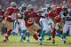 Frank Gore darts away from potential tacklers.