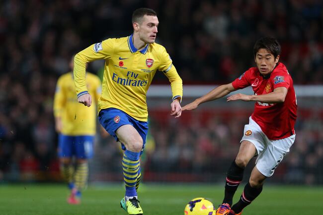 Hi-res-187573382-shinji-kagawa-of-manchester-united-competes-with-thomas_crop_north
