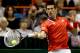 BOISE, ID - APRIL 07: Novak Djokovic of Serbia returns a shot to Sam Querrey during the Davis Cup tie between the United States and Serbia at Taco Bell Arena on April 7, 2013 in Boise, Idaho. (Photo by Matthew Stockman/Getty Images)