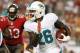 Nov 11, 2013; Tampa, FL, USA; Miami Dolphins running back Lamar Miller (26) runs with the ball against the Tampa Bay Buccaneers during the first quarter at Raymond James Stadium. Mandatory Credit: Kim Klement-USA TODAY Sports