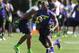 Jul 2, 2013; Beaverton, OR, USA; Running back Leonard Fournette (5) runs with the ball during the Nike 7on7 pool play at Nike World Headquarters in Beaverton, Oregon on Tuesday July, 2, 2013. Mandatory Credit: Steve Dykes-USA TODAY Sports
